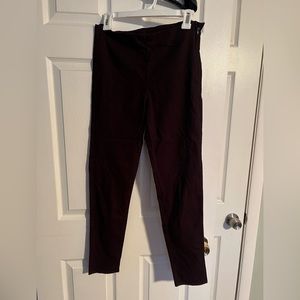 Burgundy with a hint of black Divided pants. Size 10